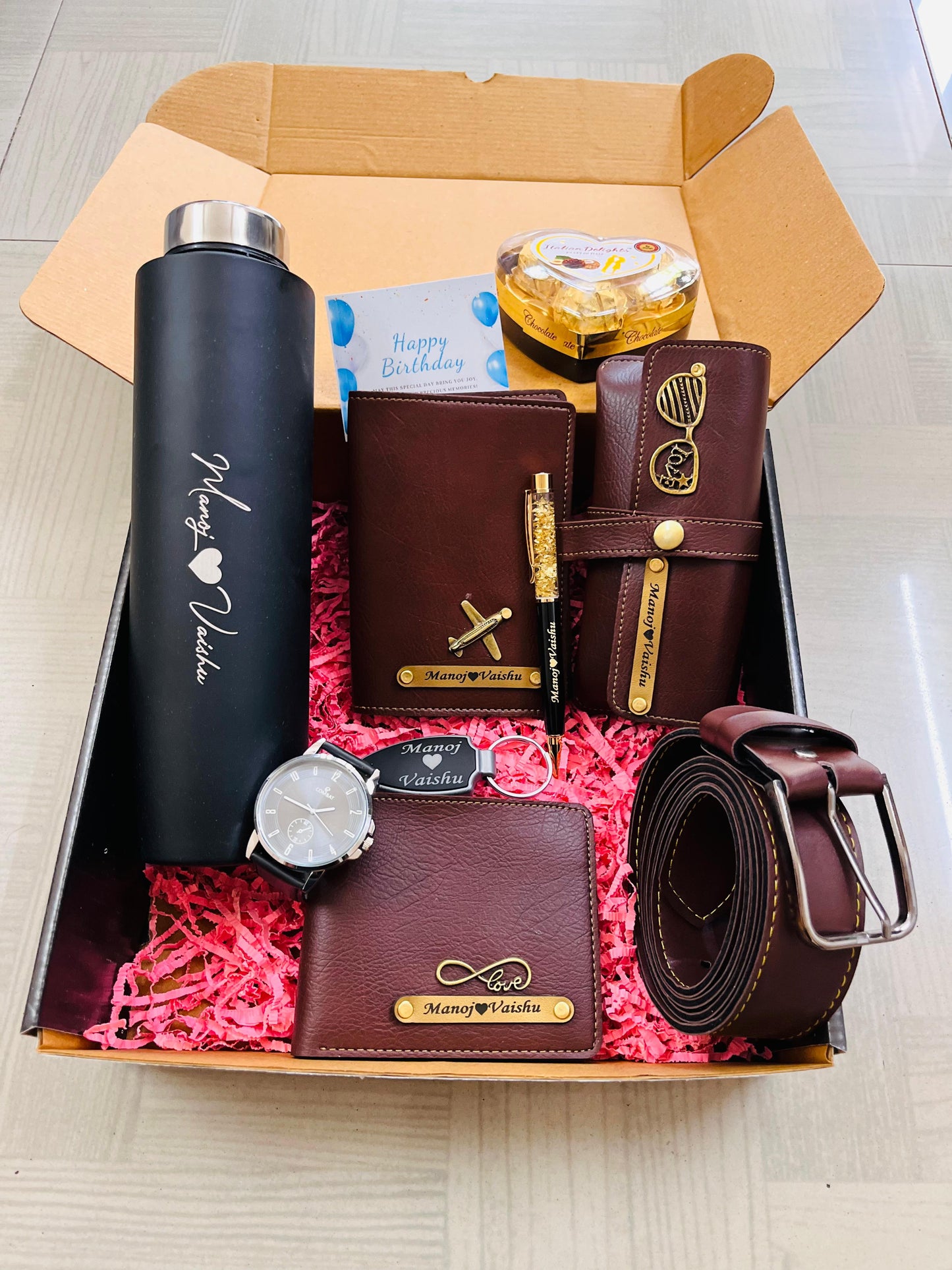 Nexon Wallet, Sunglasses Cover, Passport Cover, Led Keychains, Gold flake Pen, Steel Bottle, Belt, Watch & Heart Shaped Chocolate